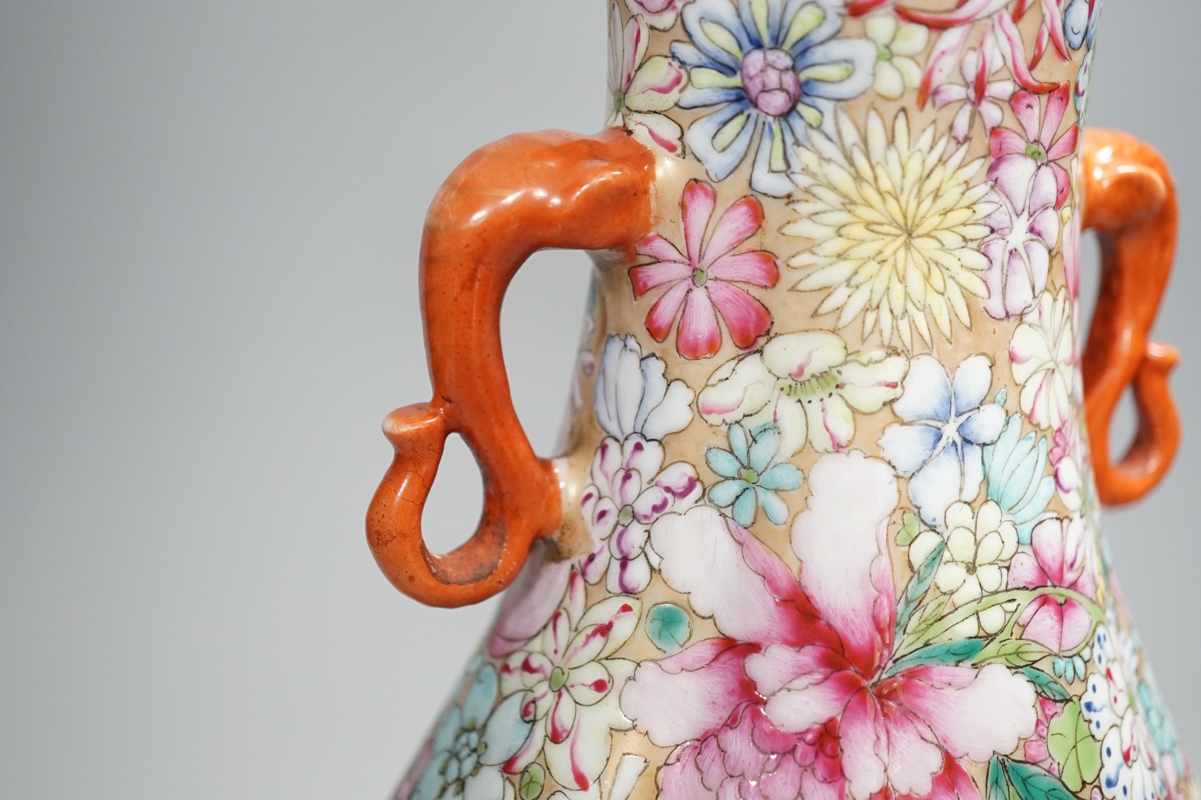 A Chinese famille rose millefleur 2 handled vase, 36cms high.